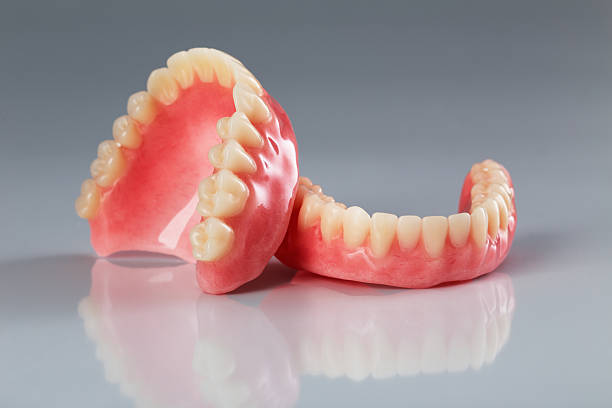 Dentures v Full Mouth Implants