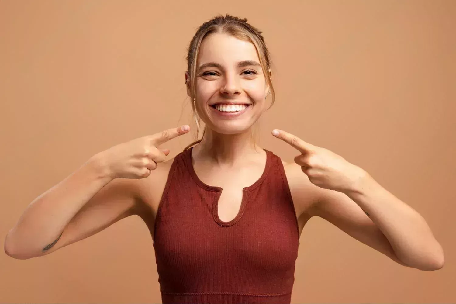 smiling-pointing-dental-2